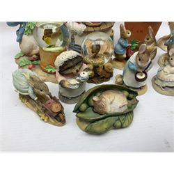 Twelve Border Fine Arts The World of Beatrix Potter and Peter Rabbit Collection figures, including Musical Tailor of Gloucester, Peter Rabbit with Miniature Waterball, Peter Hid in a Flowerpot trinket box, Jemima Puddle Duck with Herbs and Gentleman Mouse, etc
