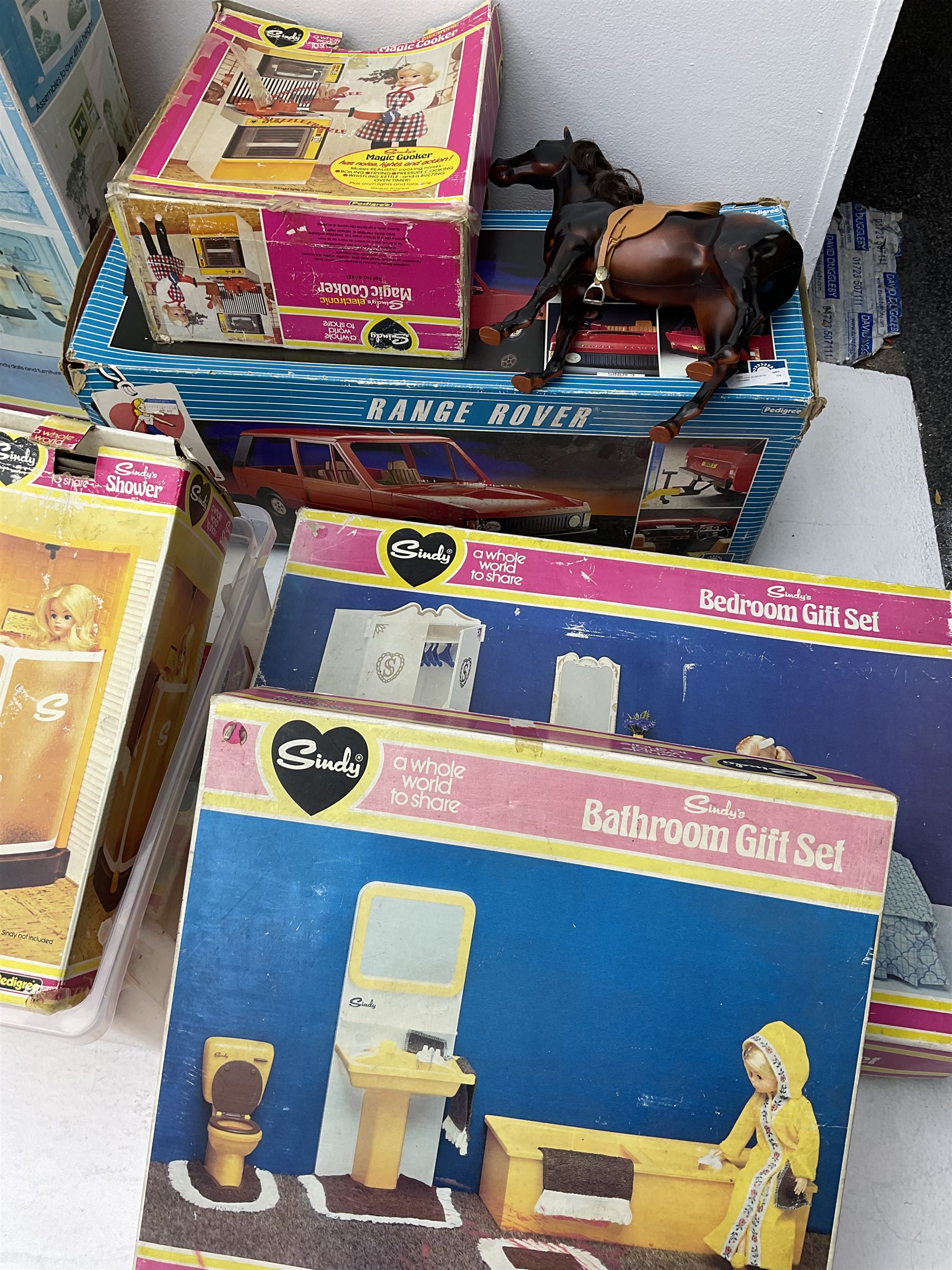 Quantity of Sindy toys to include ‘Sindy’s House’, ‘Magic Cooker’ and ‘Bathroom Gift Set’, ‘Range Rover’ all boxed, quantity of other Sindy toys, accessories and dolls, some boxed etc