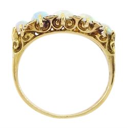 Early 20th century 15ct gold five stone graduating opal ring, with diamond accents set between