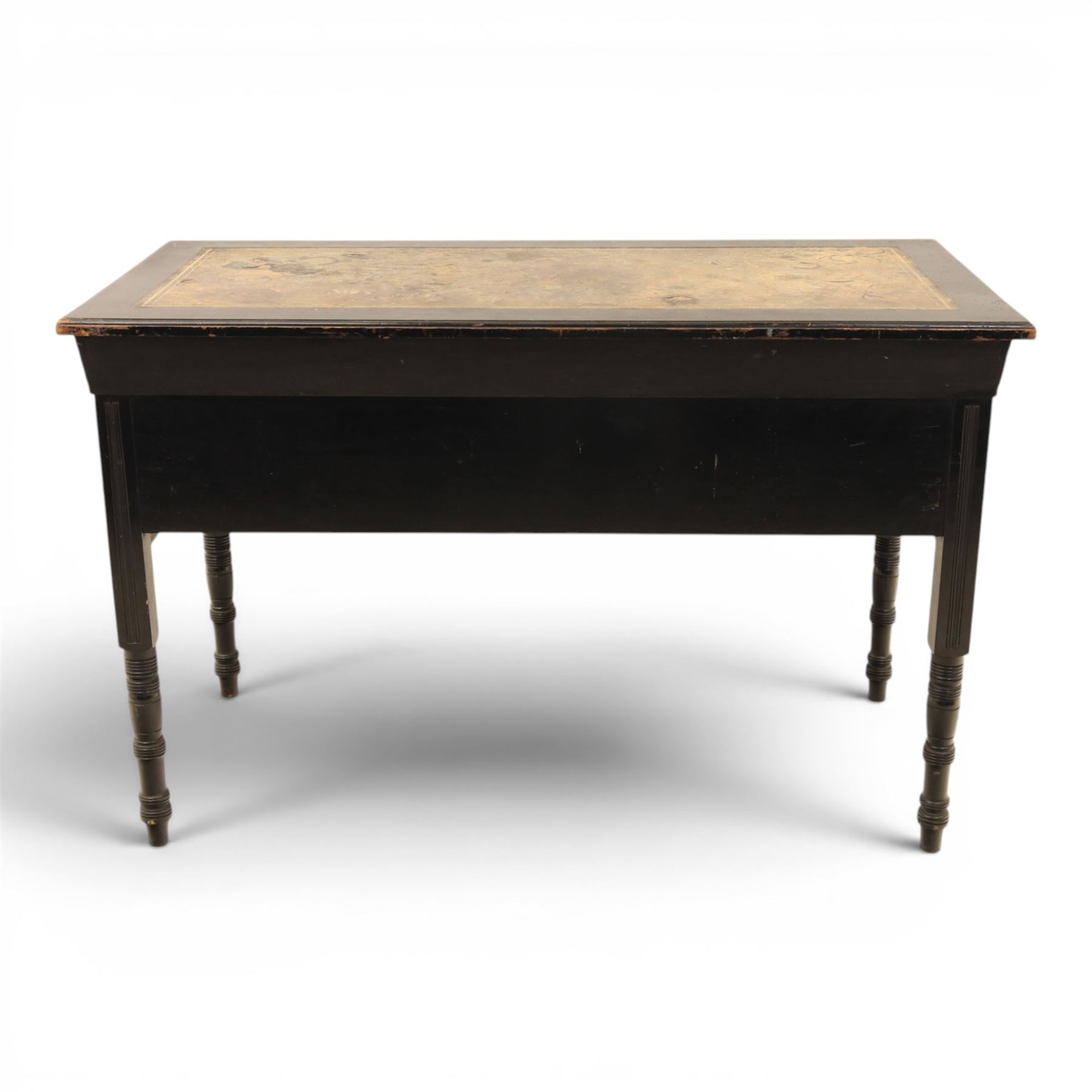 Victorian Aesthetic Movement ebonised writing desk, rectangular top with inset tooled leather, central frieze drawer with pierced spandrels, flanked by two banks of three drawers, brass swing handles, raised on turned supports 