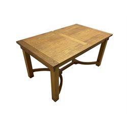 Barker & Stonehouse - oak extending dining table, on solid supports joined by curved stretchers, two additional leaves