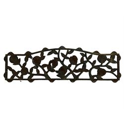 Pair cast iron garden bench ends decorated with scrolling design (H83cm), another pair of cast iron bench ends (H78cm), and a cast iron bench back decorated with foliage branches and roses (W110cm x H30cm)