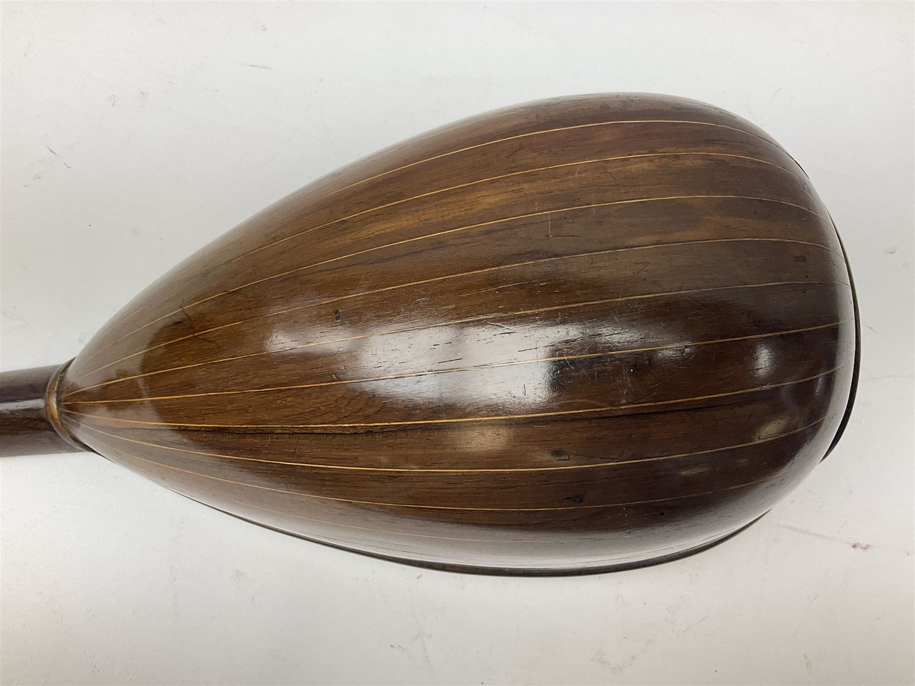 Italian mandolin, with foliate inlaid scratchplate, paper label inscribed 'Carlo Loveri & Figlio of Napoli', L62cm