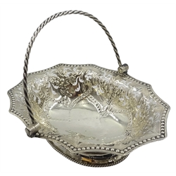  George III silver swing handle dish, pierced and embossed flower decoration by William Plummer, London 1765, L16cm, approx 4oz   