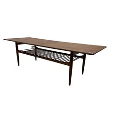 Kofod Larsen for G-Plan - mid-20th century  teak coffee table, rectangular top over spindle slatted undertier, raised on tapering supports 