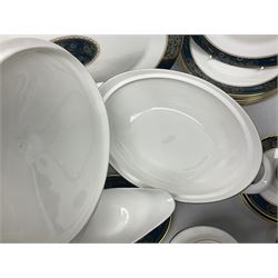 Royal Doulton Carlisle pattern dinner service for eight, to include dinner plates, side plates, soup bowls, dessert plates, two covered tureens, sauce boat and saucers etc
