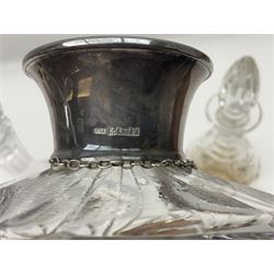 Silver mounted cut glass decanter, with silver collar and glass stopper, hallmarked JP, Birmingham, 1972, with silver scotch label, hallmarked A Marston & Co, Birimingham,1970, with two other glass decanters
