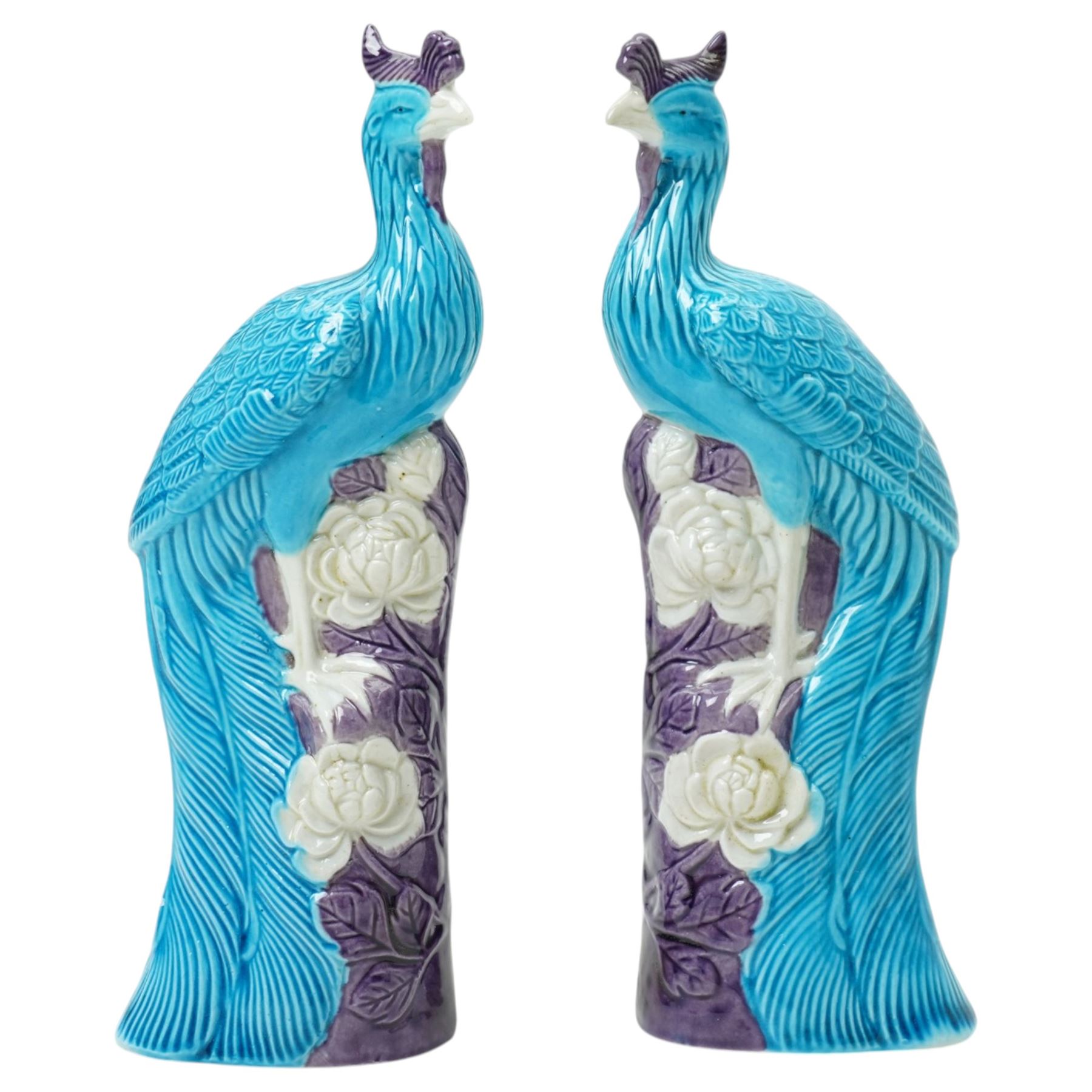 Pair of Chinese turquoise glazed phoenix figures, H20.5cm, together with a set of four crane figures perched upon stumps, H8.5cm (6)