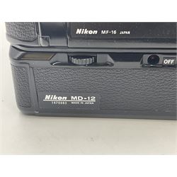 Nikon FM2n camera body, serial no. N8683100, with 'Nikon Zoom-NIKKOR 35-70mm 1:3.3-4.5' len, serial no. 2236565, Nikon MF-16 data back, serial no. 212905 and Nikon MD-12 Motor Drive, serial no 1570382 