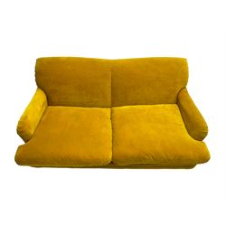 Loaf - large two seat 'Jonesy' sofa, upholstered in mustard velvet fabric with sprung back and loose seat cushions, raised on pale oak turned supports