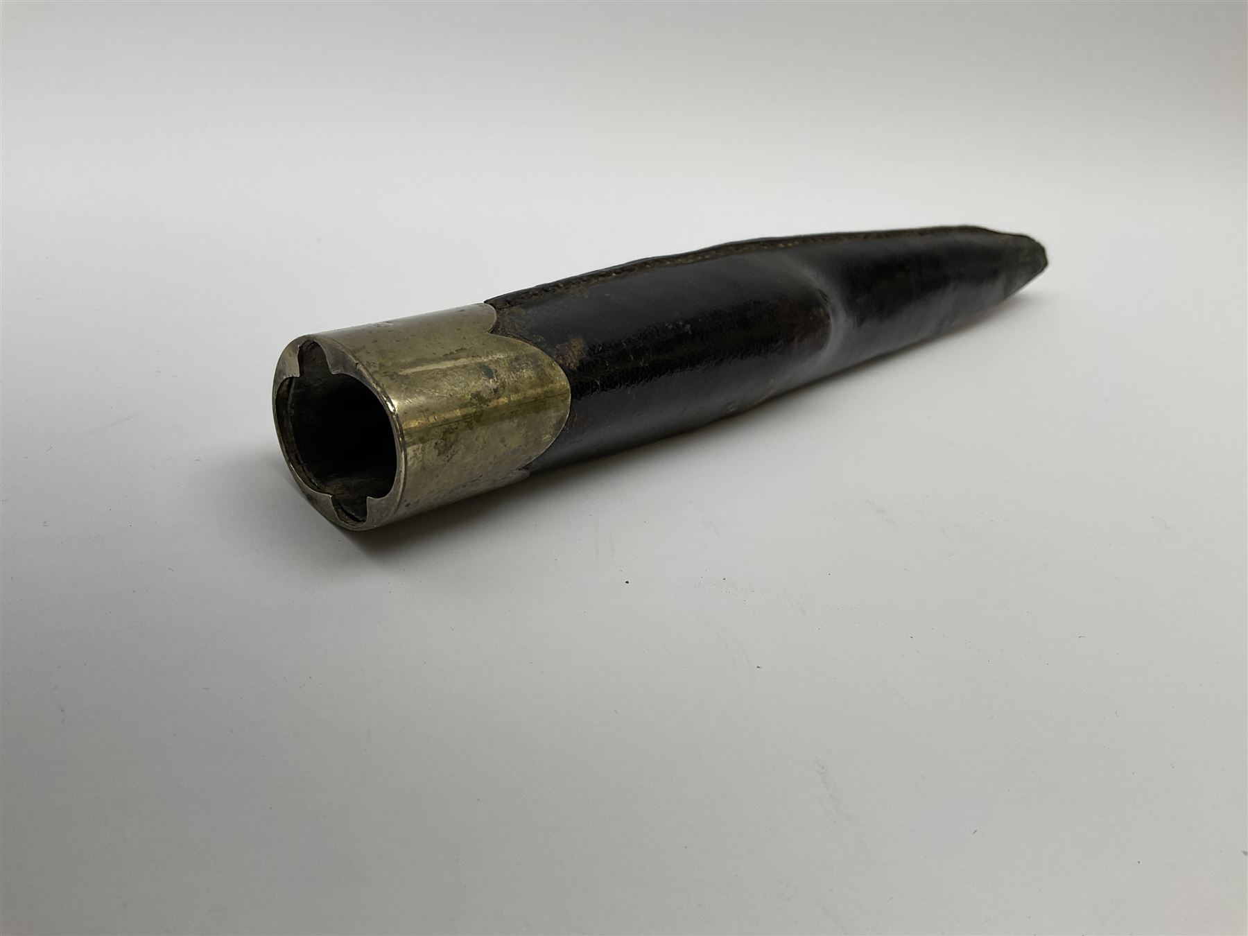 Rare double barrel percussion knife pistol by Dumonthier & Sons (NVN), approx. .38 calibre, with 8.5cm barrels and central 21.5cm spear pointed blade, all with etched damascening, upper quillons serve as hammers for the percussion ignition with single drop down trigger and fluted nickel grips, in nickel mounted leather covered tin scabbard L33.5cm overall