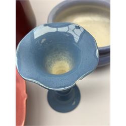 Two Bretby jardinières, hexagonal planter and trumpet shaped vase,  preserve pot and chamberstick together with an Ault pink glazed candlestick and low comport (8)