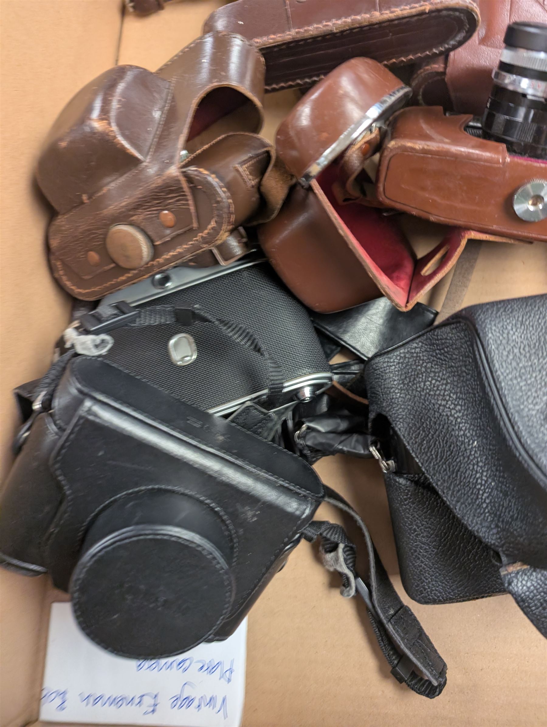 Eight vintage cameras, including Yashica MG-1, Yashica Lynx 1000, Koroll 24 S, Paxette and Fujifilm X10