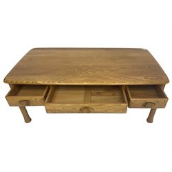 Ercol - 'Sappho' (842) elm coffee table, fitted with three drawers