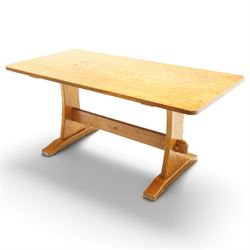 Acornman - adzed oak refectory dining table, rectangular adzed top with rounded corners raised on twin shaped end supports terminating to sledge feet united by pegged stretcher, carved with acorn signature