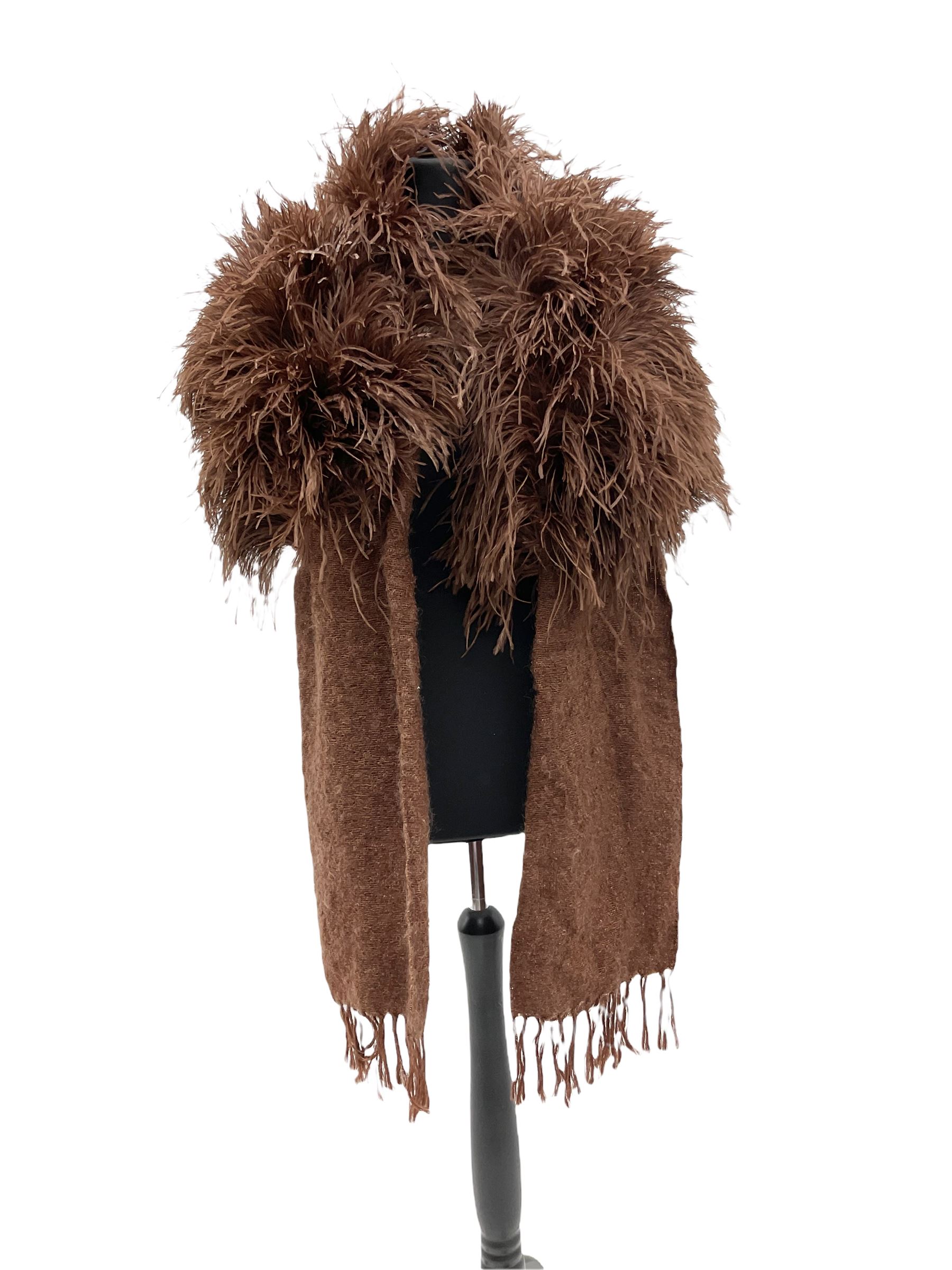 White Saga fox stole, together with Cresta Red fox fur hat, Red fox fur headband, a fur headband and matching cuffs, Harris Tweed clutch bag with fur trim, a fur clutch bag and an Ostrich feather and mohair scarf. 