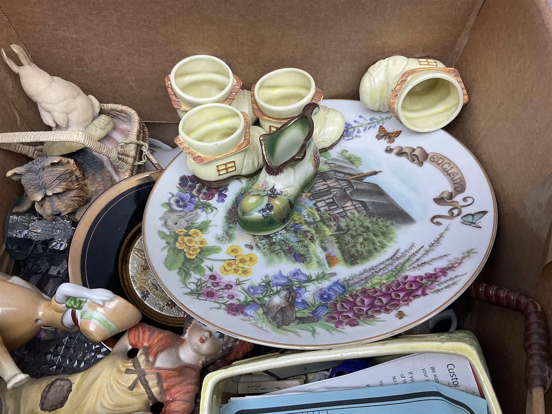 Dolls of the world, together with glass decanters, tea wares and other collectables, in two boxes 