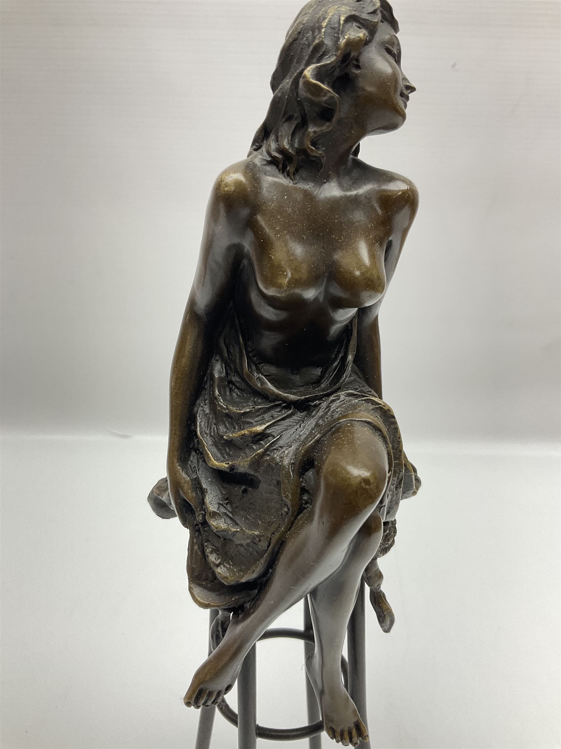Art Deco style bronze, modelled as a semi naked female figure seated upon a chair. H27cm.

Created in the style of French Artist, Pierre Collinet, who was recognised for his bronze sculptures. This figure echoes the style and tone of Collinet's work and is attractive to behold. It would make for a lovely decorative addition to any home, modern or traditional. 