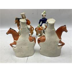  Pair of Staffordshire figures of children on horseback, together a similar pair  of a man and woman on horseback, tallest example H20cm