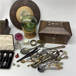 A group of assorted collectables, to include a cased set of silver teaspoons, hallmarked Cooper Brothers & Sons Ltd Sheffield 1925, a silver napkin ring, hallmarked James Swann, Birmingham 1904, a cheese knife with silver handle, hallmarked Harrison Brothers (probably), Sheffield 1946, a clear glass scent bottle, small ruby glass scent bottle, and a further later example, a Caithness glass paperweight, green glass buoy, Royal Crown Derby miniature cup, Helena Wolfsohn miniature cup and saucer, assorted silver plate including a large ladle with engraved monogram to terminal, snuff box with suspension ring, assorted clay and wooden pipes, carved wooden frame, wooden desk book stand, etc.