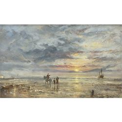 John Lewis Chapman (British 1946-): A Sunset Ride on the Beach, oil on board signed 24cm x 40cm