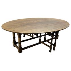 Large 18th century design oak wake or dining table, oval drop-leaf top, turned supports with double gate-leg action base, united by moulded stretchers 