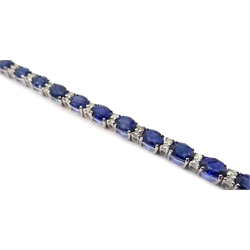  18ct white gold oval cut sapphire and round brilliant cut diamond bracelet, stamped 750, total sapphire weight approx 12.00 carat  