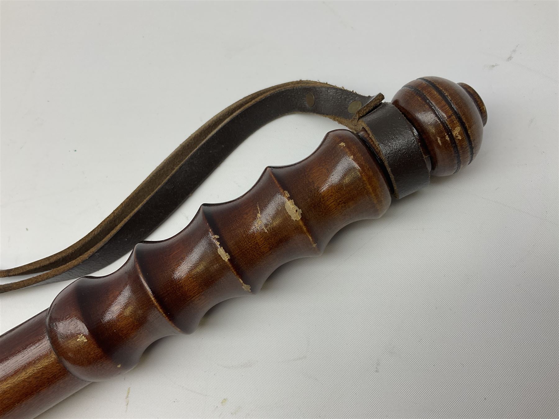 Three police turned hardwood truncheons comprising two patrol truncheons and WPC short truncheon (3)