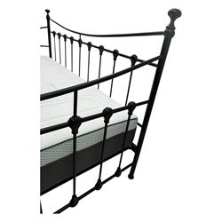 Contemporary Victorian revival black metal day bed, featuring arched back and sides with turned finials and spindle rails, complete with single 'OTTO' mattress