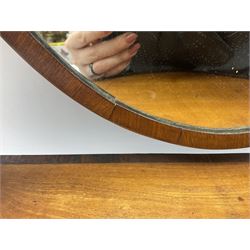 Regency satinwood and rosewood toilet mirror, oval swing mirror over serpentine front base fitted with three drawers, on bracket feet