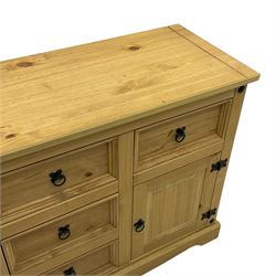Pine sideboard, fitted with five drawers and two cupboards
