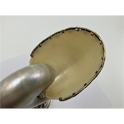 Modern limited edition silver mounted nautilus shell cup, no. 42/150, the pearlescent shell cup with silver-gilt strapwork to rim, upon a stem modelled as a putto supporting a gilt cornucopia and circular domed foot depicting Poseidon amongst swirling waves, hallmarked by St James House Company, London 1980,  H17.5cm