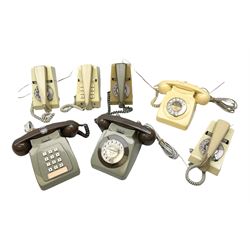 Quantity of mid 20th century telephones to include examples with rotary dials
