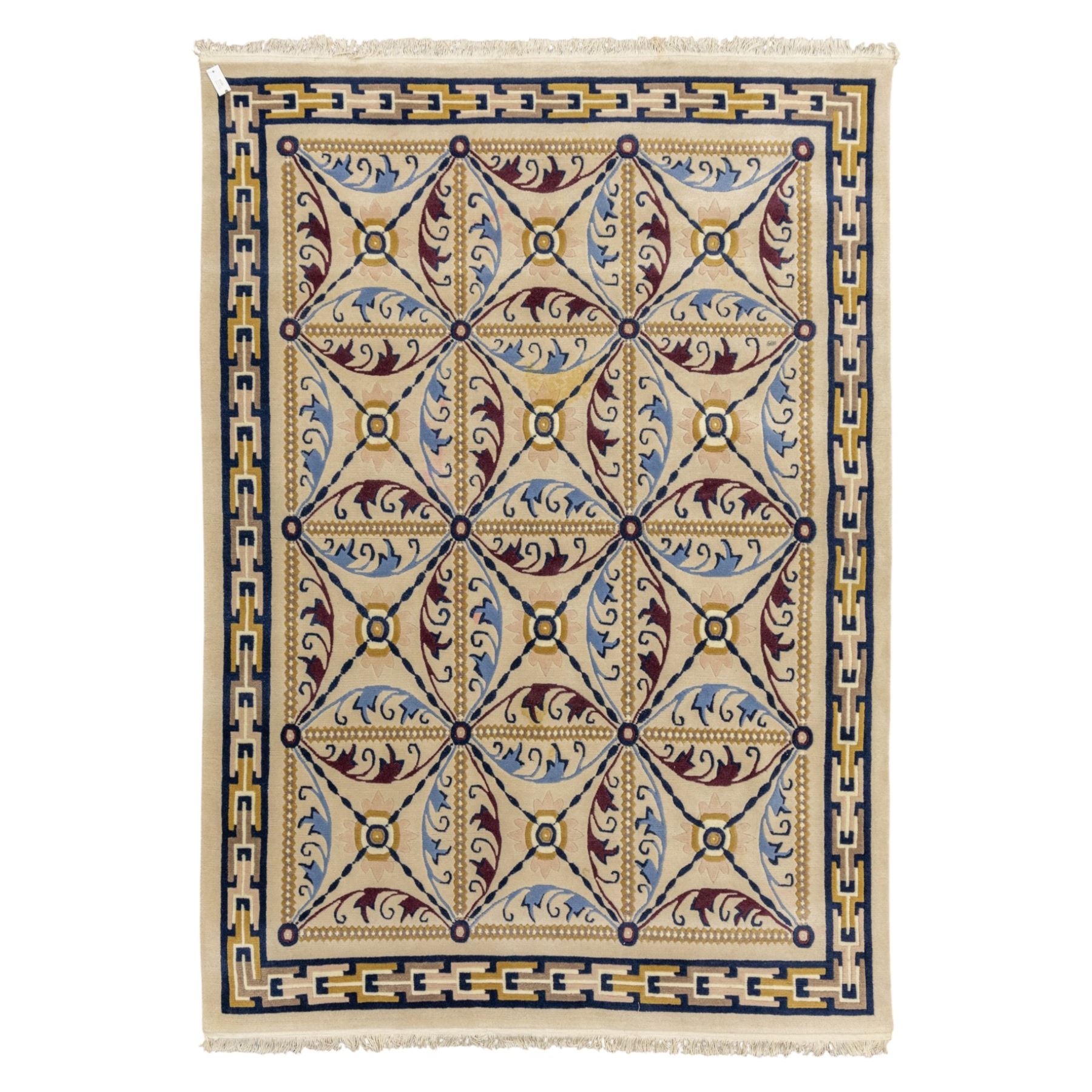 Rugs by Design - Nepalese wool rug, cream field decorated with repeating diamond trellis enclosing scrolling foliate motifs in blue, burgundy and ochre, within chain-link border and fringed ends