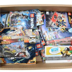 Quantity of loose Lego from various kits, together with a collection of Lego instruction booklets for various sets, including Marvel, Star Wars, DC Comics Dr Who, etc 