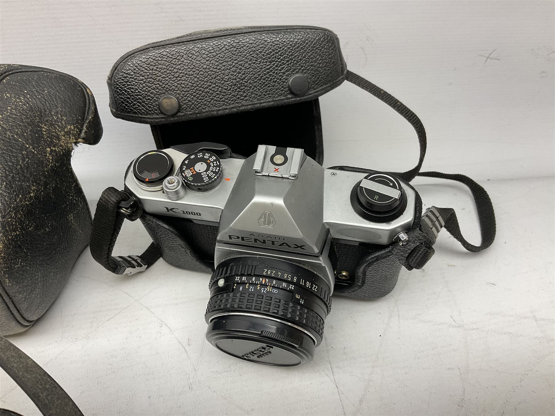 Quantity of cameras and lenses to include Topcon Unirex camera etc with cases