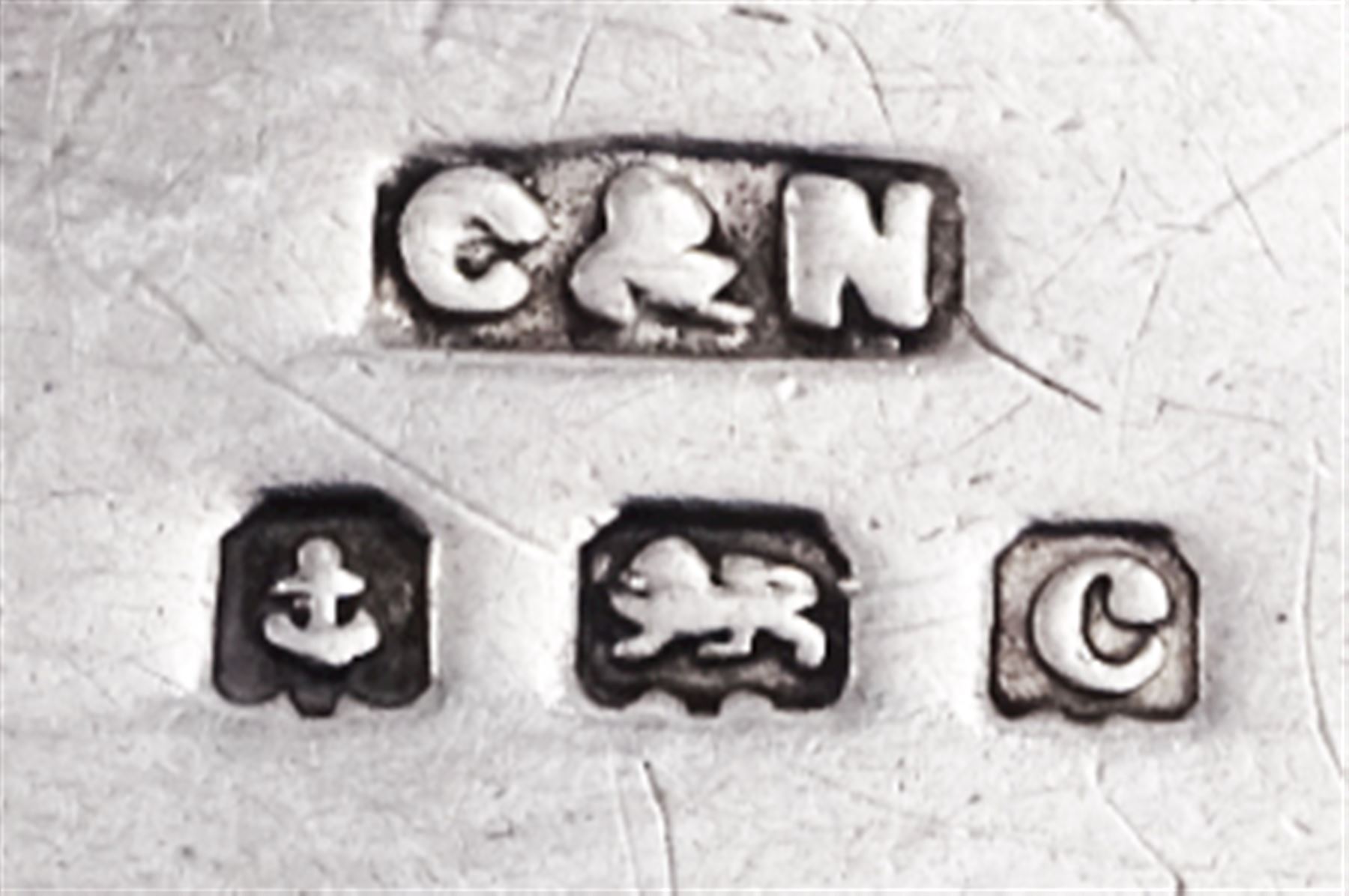 Two Edwardian silver stamp holders modelled in the form of envelopes, the first example detailed 'Stamps', hallmarked Crisford & Norris Ltd, Birmingham 1903, the second of plain form, hallmarked Crisford & Norris Ltd, Birmingham 1902, approximate total weight 0.38 ozt (11.8 grams)