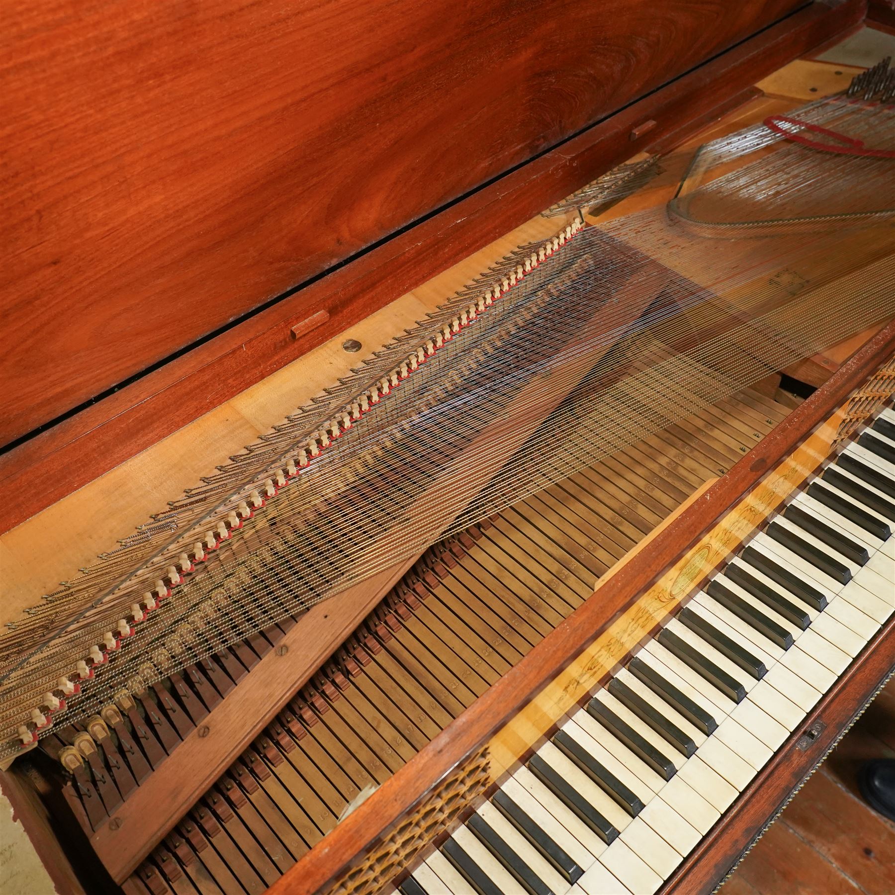 Early 19th century George IV Square Piano by William Rolfe & Co, 112 Cheapside, London, c1821. Mahogany veneered case with rosewood crossbanding and brass stringing, with sustain pedal and reeded legs on a tapered spiral with brass capitals, with three music draws beneath and a folding duet music stand, nameboard with makers name on a round gilt medallion and open silk backed fretwork to the ends, serial No 6699, double strung, English double action with 68 ivory and ebony keys, F1-C7. original strings, hammers and dampers, soundboard and bridge in good condition, with original makers written instructions on regulating the action and tuning the piano attached to the inside of the instrument. In good condition, however the action is in need of regulation and tuning.
William Rolfe is thought to have been in business between 1785 and 1828. 
Given the intricate nature of these historic instruments, specialist support will be available if required, to assist successful buyers with safe removal and onward handling. Price upon application.


This item has been registered for sale under section 10 of the APHA Ivory Act Reference PB6GL6SZ