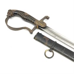 Prussian cavalry officer's sword with unmarked 78cm slightly curving fullered steel blade, steel hilt with traces of gilding, crossed swords insignia to langet, stirrup knuckle bow, wire bound black grip and lion's head pommel with inset 'ruby' eyes, in black painted steel scabbard with single suspension ring L95.5cm overall
