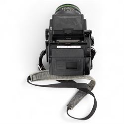Zenza Bronica ETRS medium format camera, serial no. 8301079, with Zenza Bronica Zenzanon EII 1:2.8 f=75mm lens with lens cap, serial no. 7955198 and two film backs and instruction booklet