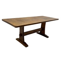 Yorkshire Oak 'Kingpost' - oak dining table, rectangular adzed top on tapered end supports, united by pegged stretchers carved with kingpost signature, on sledge feet, by Robert Ingham, Burton Leonard, Harrogate 