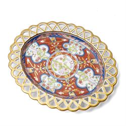 Collection of Spode Imari pattern no. 283 wares, comprising two plates and chestnut basket with stand, basket W20cm
