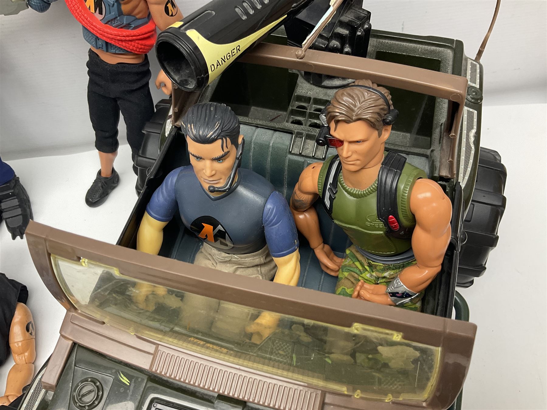 Action Man - Hasbro Strike Force Battle Tank by Sunny Smile; jeep; ten various period dressed figures; and quantity of weapons and other accessories including motorcycle etc