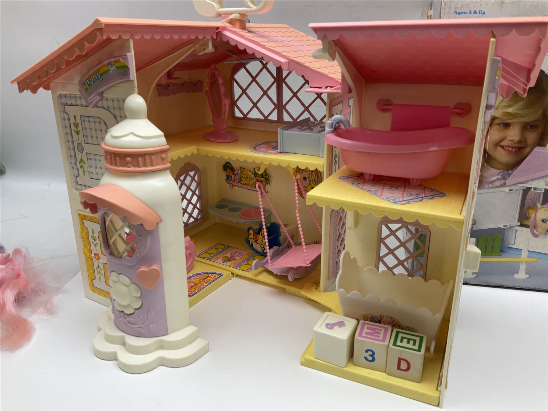 1980s Hasbro My Little Pony - Dream Castle and Show Stable; both boxed, together with Lullaby Nursery and Carry Case; ten generation one ponies, including Majesty, Skydancer and Locket; and assorted accessories 