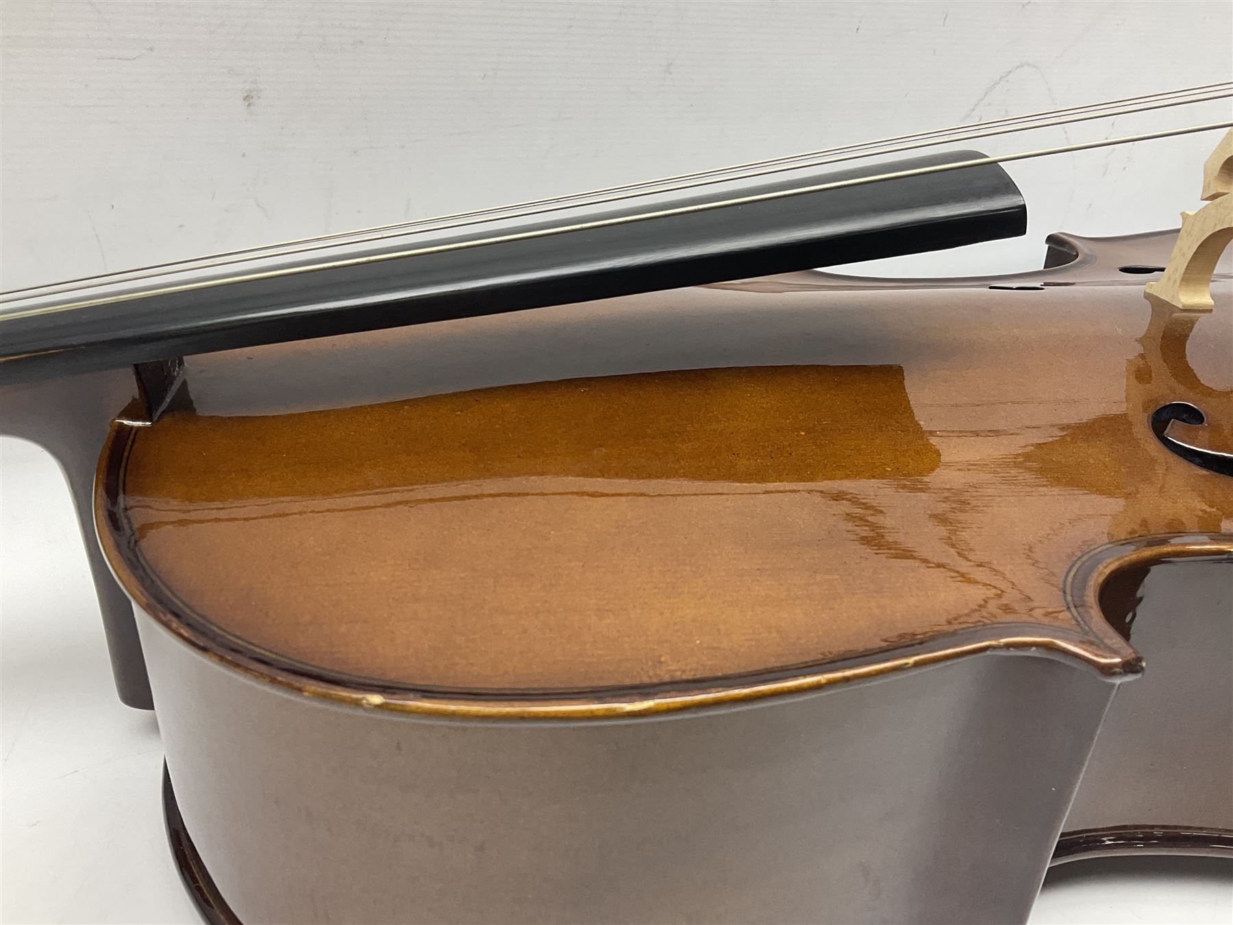 Stentor Student I quarter-size cello with 59.5cm two-piece maple back and ribs and spruce top; bears maker's label with serial no.M072648 L95.5cm overall; in Stentor soft carrying case with bow