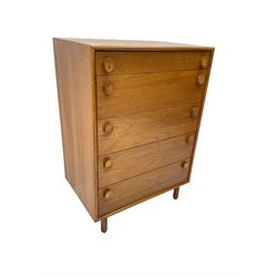 Meredew - mid-20th century teak chest of drawers, fitted with five drawers each with oval wood handles