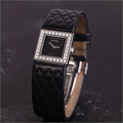 Chanel Matelassé ladies diamond stainless steel quartz wristwatch, black quilted dial, with round brilliant cut diamond bezel, back case No. 77835 and dated 2003, on quilted leather strap with fold-over-clasp 