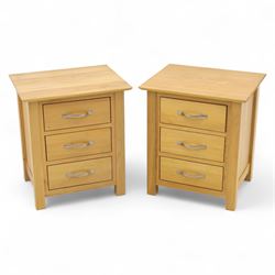 Modern oak veneered bedside chests, each fitted with three drawers and brushed steel handl...
