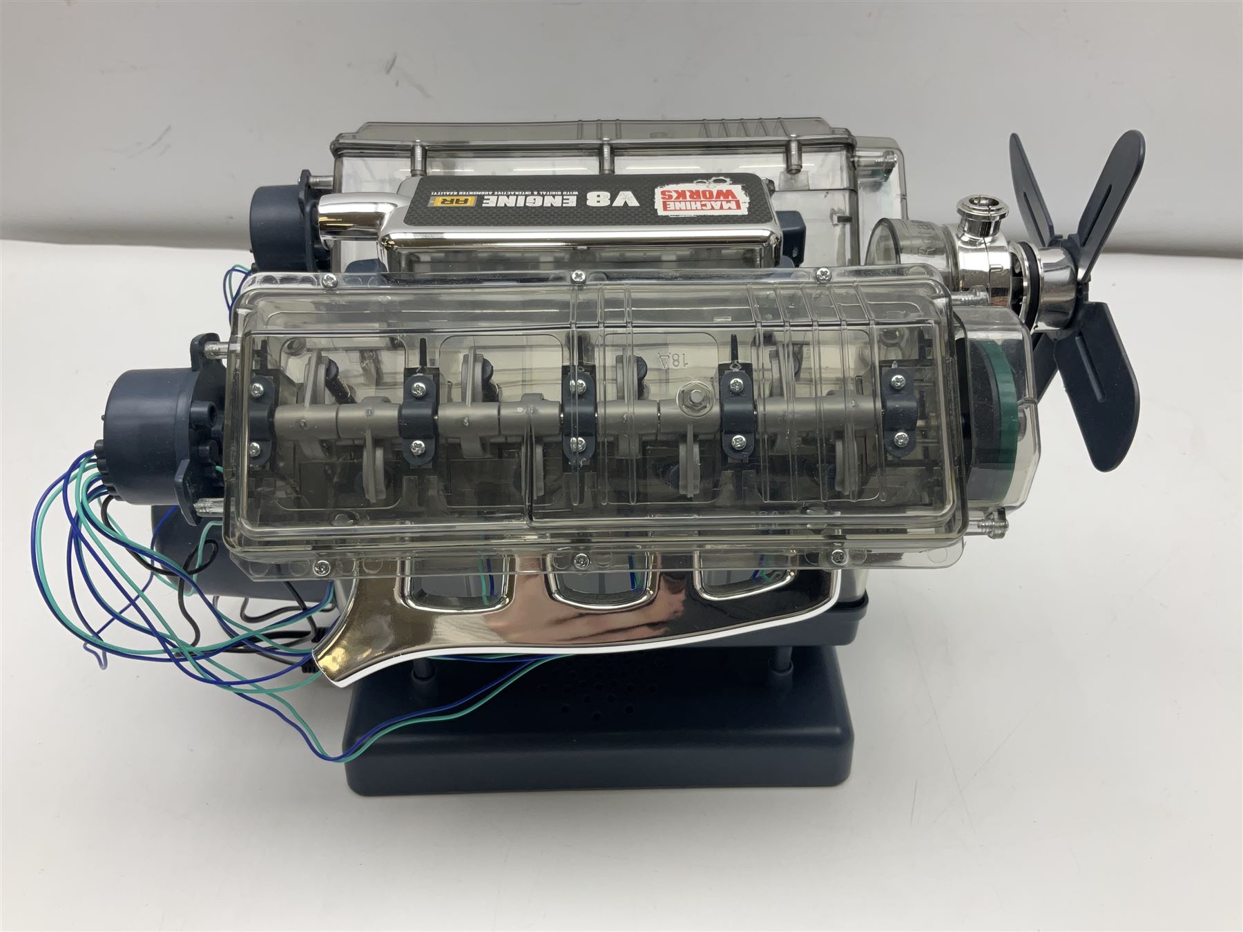 Machine Works battery operated model of a V8 car engine featuring working parts, sound and illuminating spark plugs L29cm
