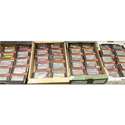 Forty Exclusive First Editions die-cast model buses, all boxed, in four boxes